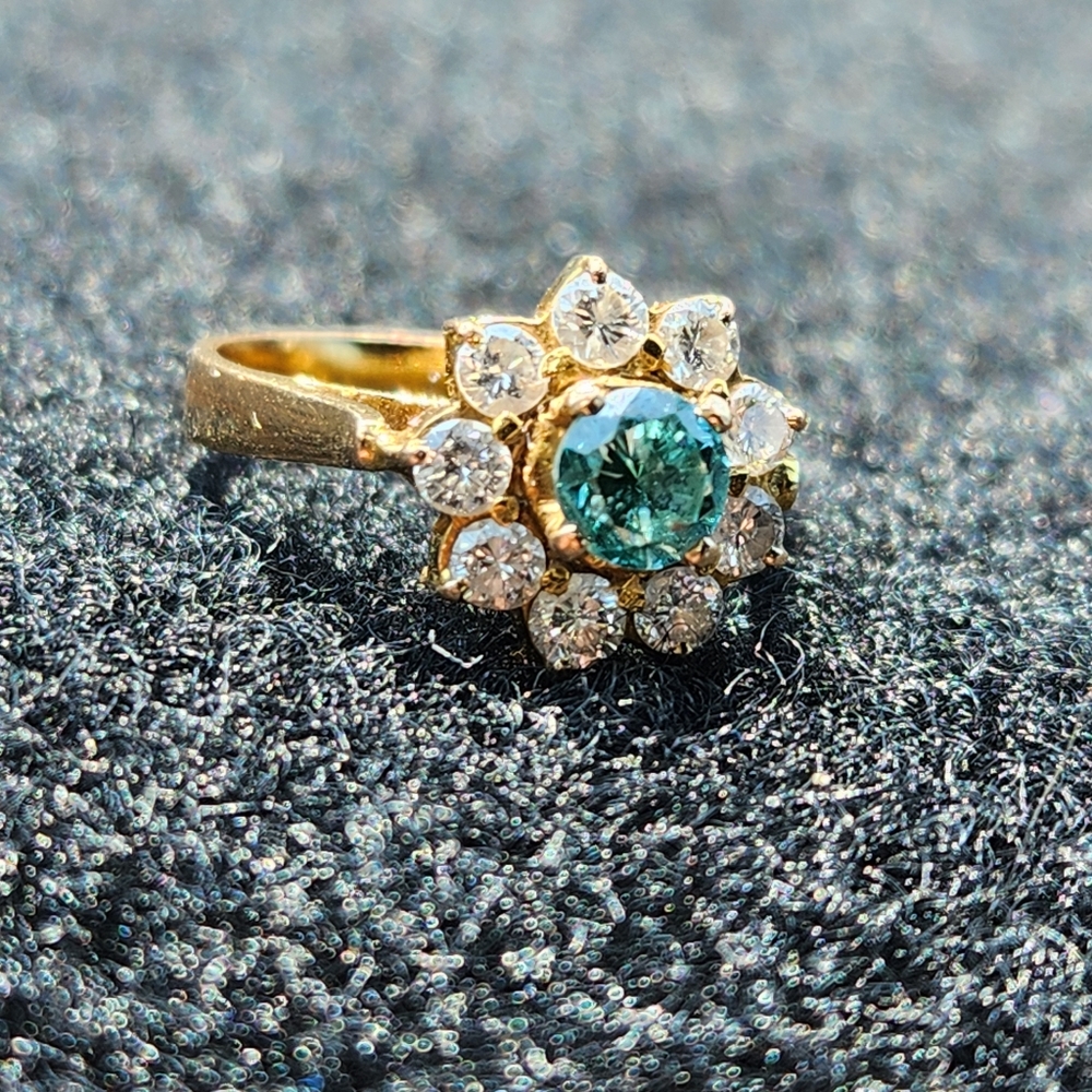 Blue and White Dimond Flower Ring on 18K Gold. It Is Made With 10 Dimonds!